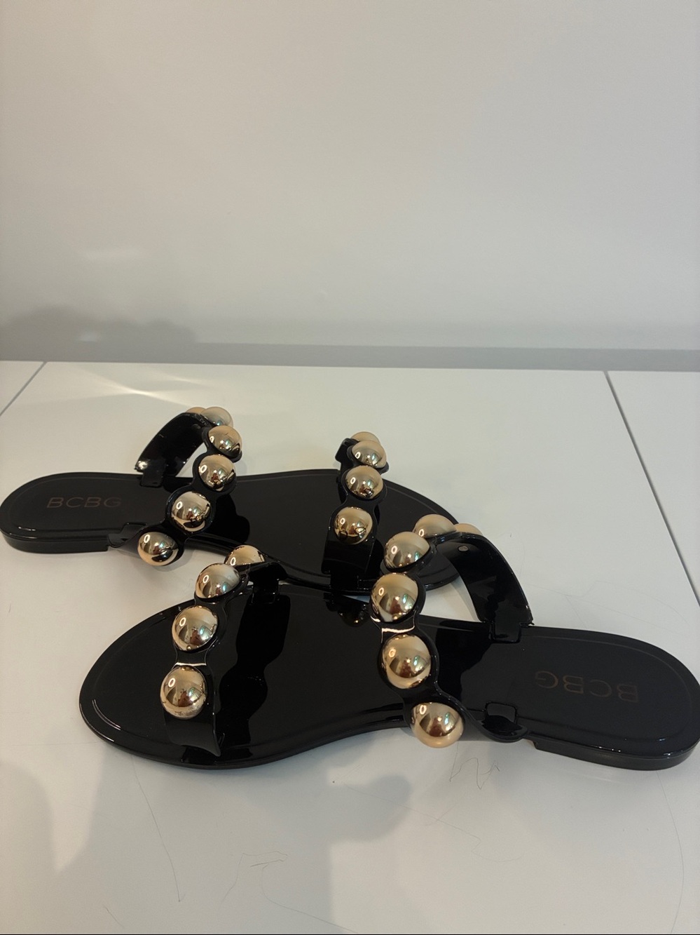 BCBG Black Patent Slide Sandal with Gold Orb Accents